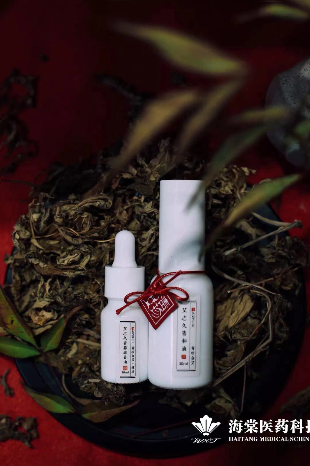 Two small white bottles on a bed of moss.